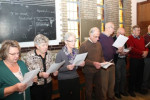Het koor op de repetitie